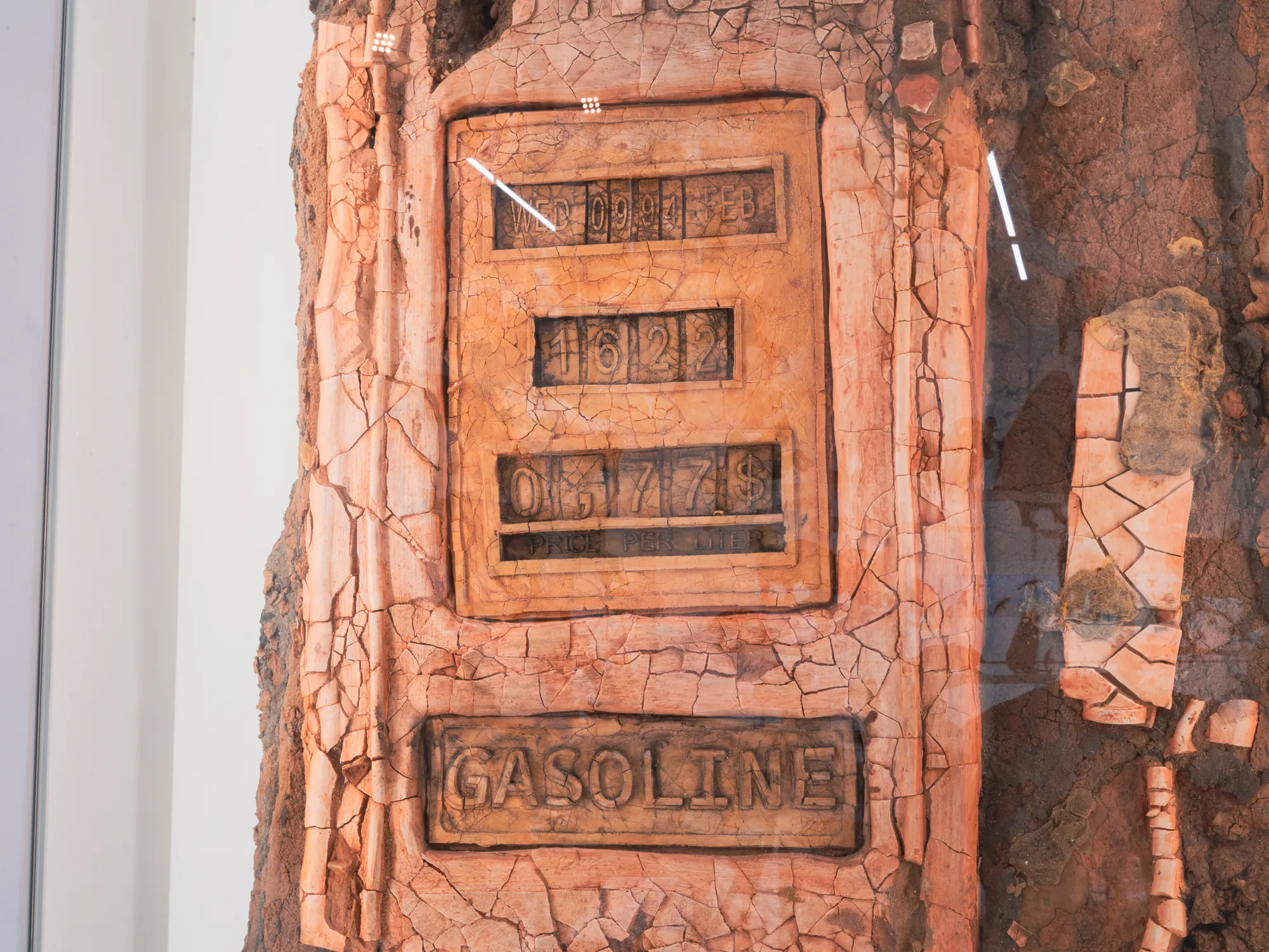 Detail: GASOLINE inscription and pump counters