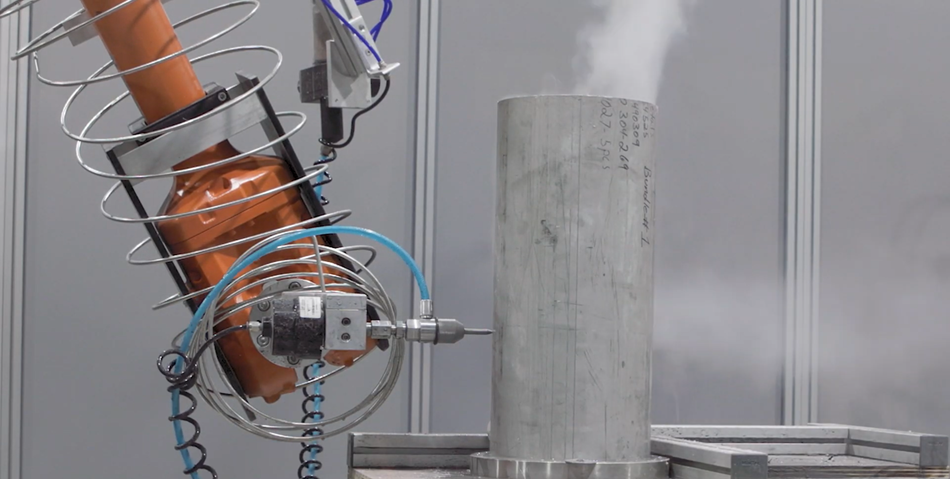 6-Axis Abrasive Robotic Waterjet system with ABB robots for cutting complex metal parts. 