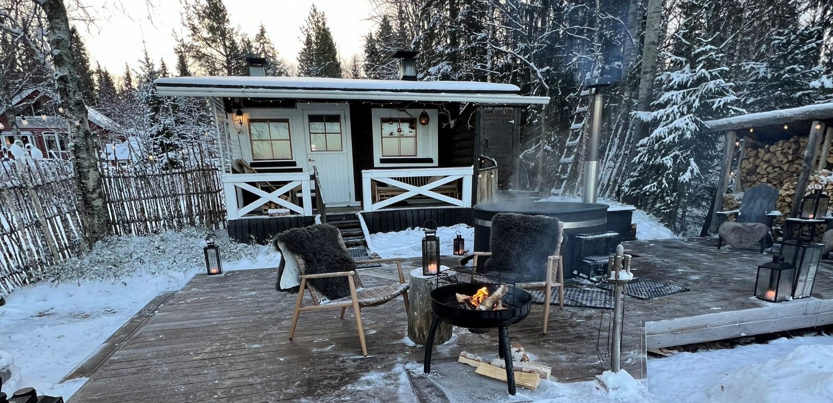 Sauna, hot tub and snowy terrace
