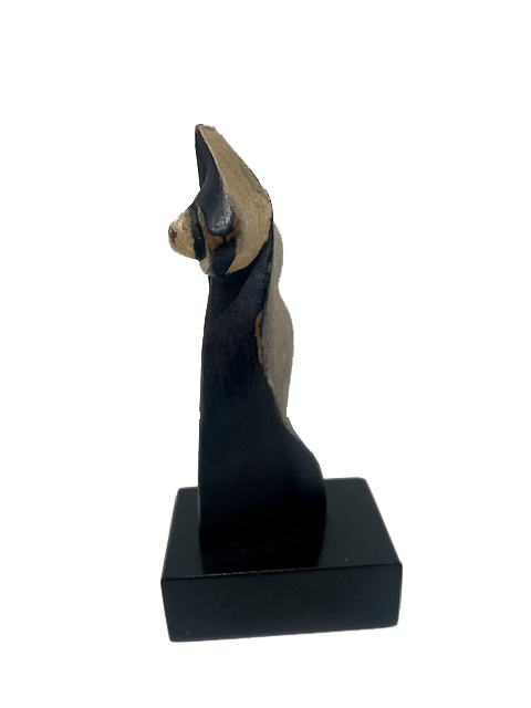 Abstract sculpture by Óscar Domínguez, a female figure in polychromed bronze, with flexible and deformed shapes, combining organic volumes and colored patina, in a surrealist spirit.