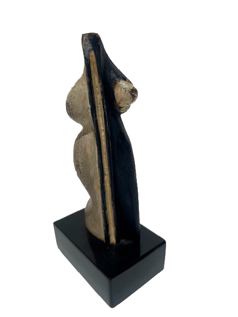 Surrealist work by Óscar Domínguez, silhouette of a stylized woman in polychrome bronze, fragmented shapes and fluid curves, evoking a dreamlike and enigmatic body