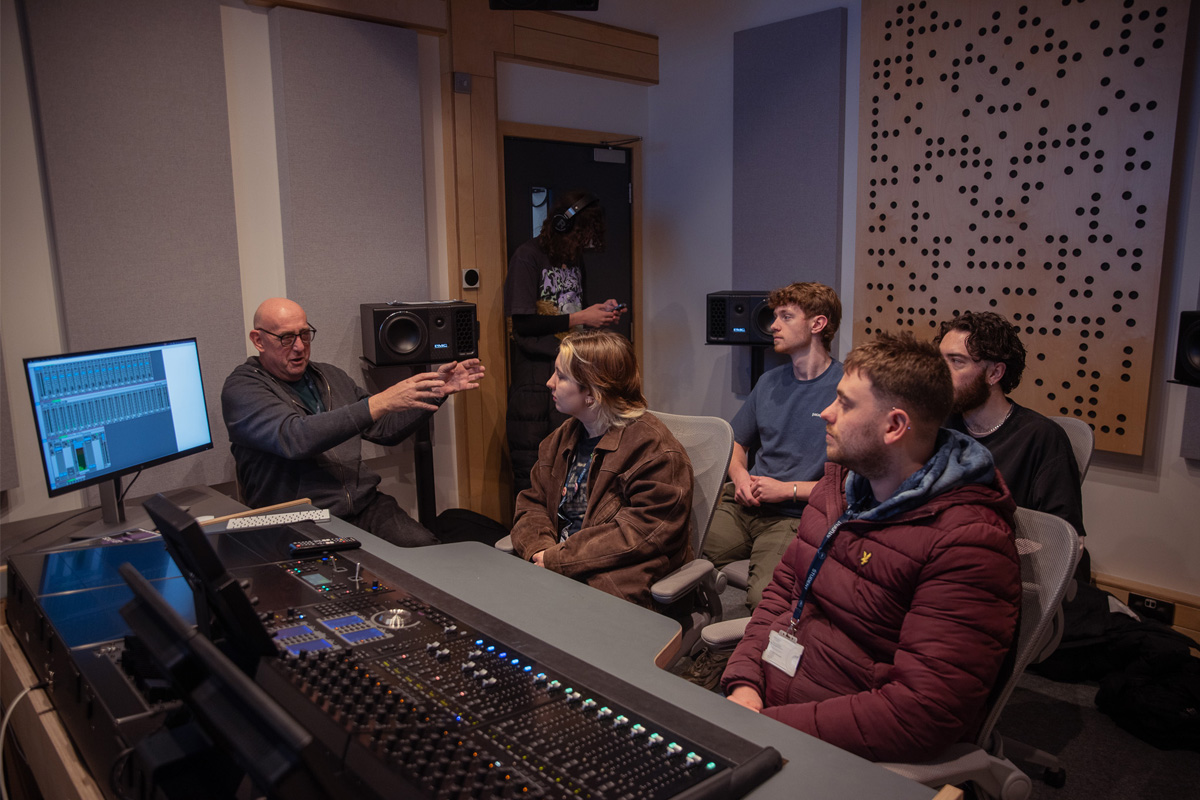 Dave Pemberton teaching a group of students in the Dolby Atmos suite