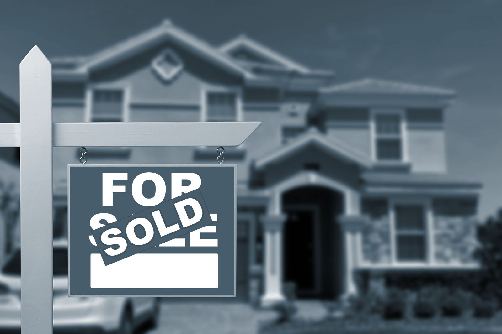 Sold sign in front of a house, shown in Ignite's blue duotone style