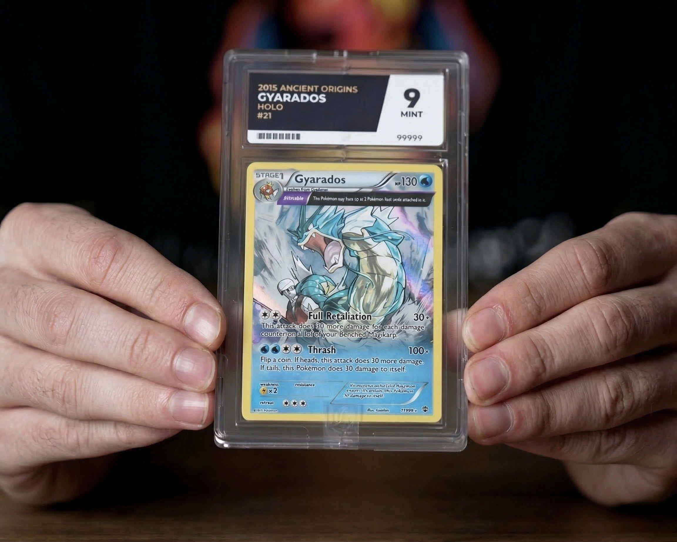 Close-up of a Pokémon trading card in a protective transparent case