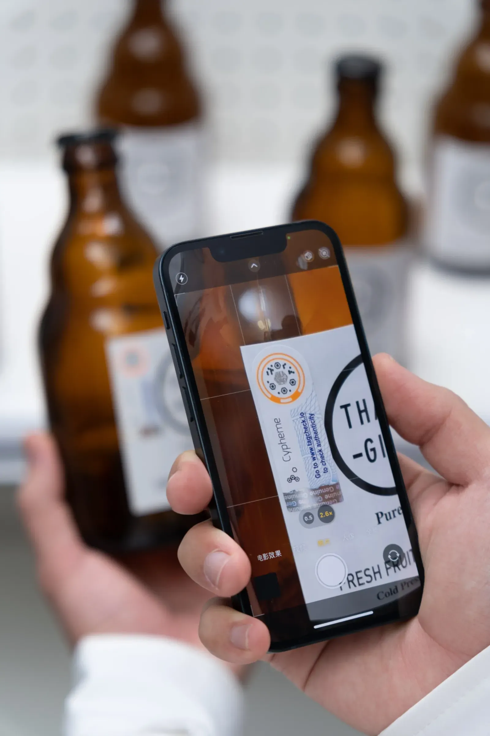A person scanning a Noise Print label using a smartphone
