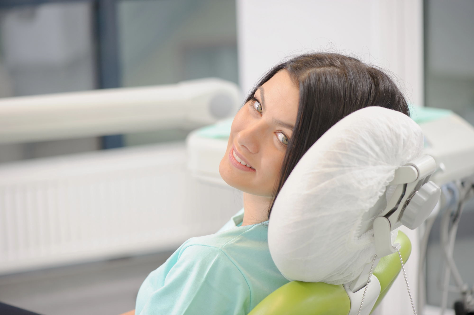 woman dental patient smiling at the cosmetic dentist Miramar