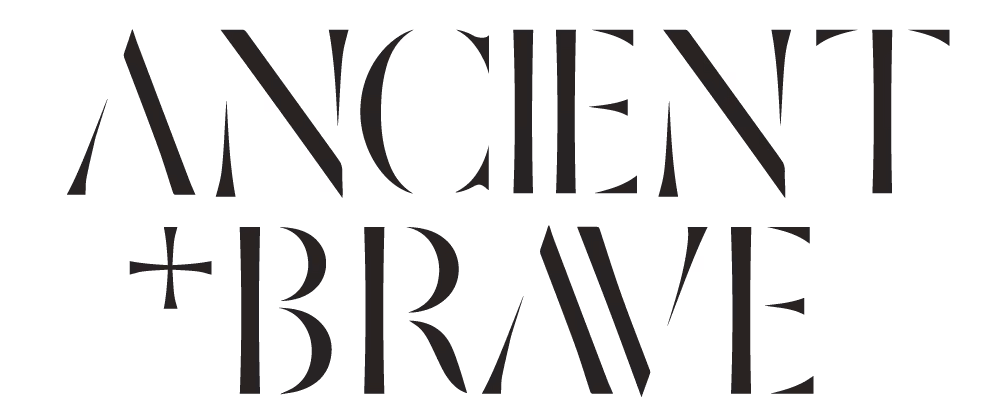 Stylized black text reading Ancient + Brave in uppercase letters on a white background.