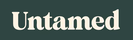 The word Untamed in cream serif font on a dark green background.
