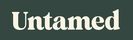 The word Untamed in cream serif font on a dark green background.