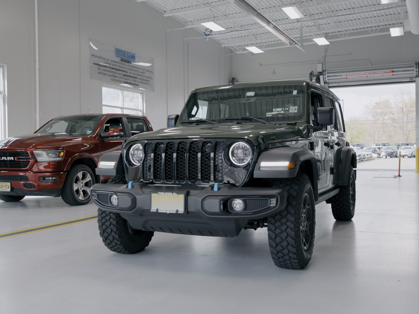 A Jeep parked inside a garage.