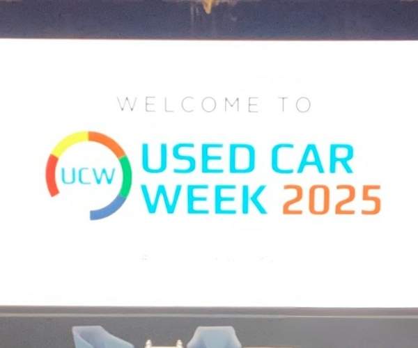 Screen at Presentation with the text "Used Car Week 2025"
