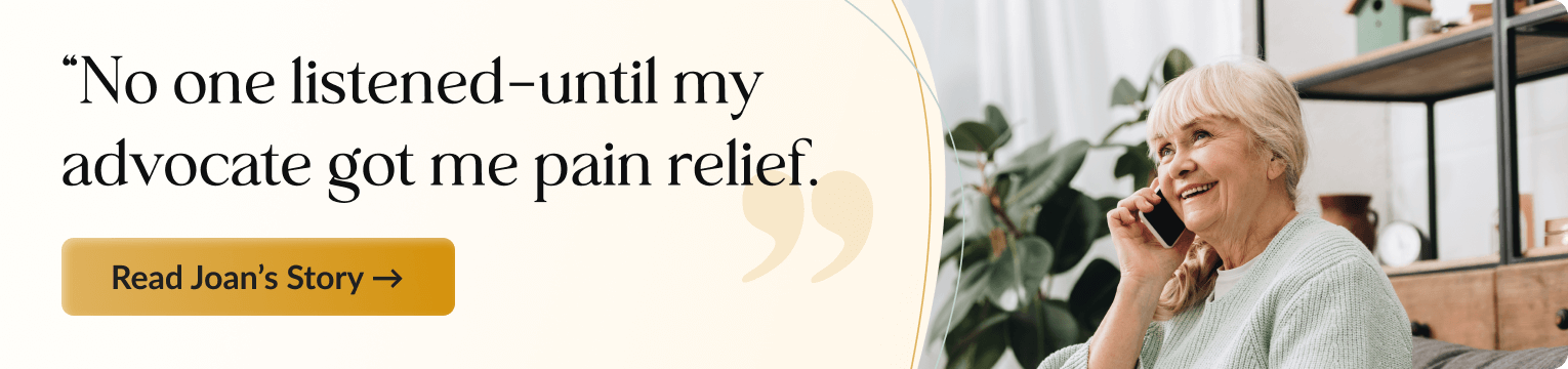 Elderly woman with blonde hair wearing a white sweater, smiling while talking on a phone in a modern living room with plants and shelving in the background. Banner text: "No one listened—until my advocate got me pain relief." Includes a button: Read Joan's Story.