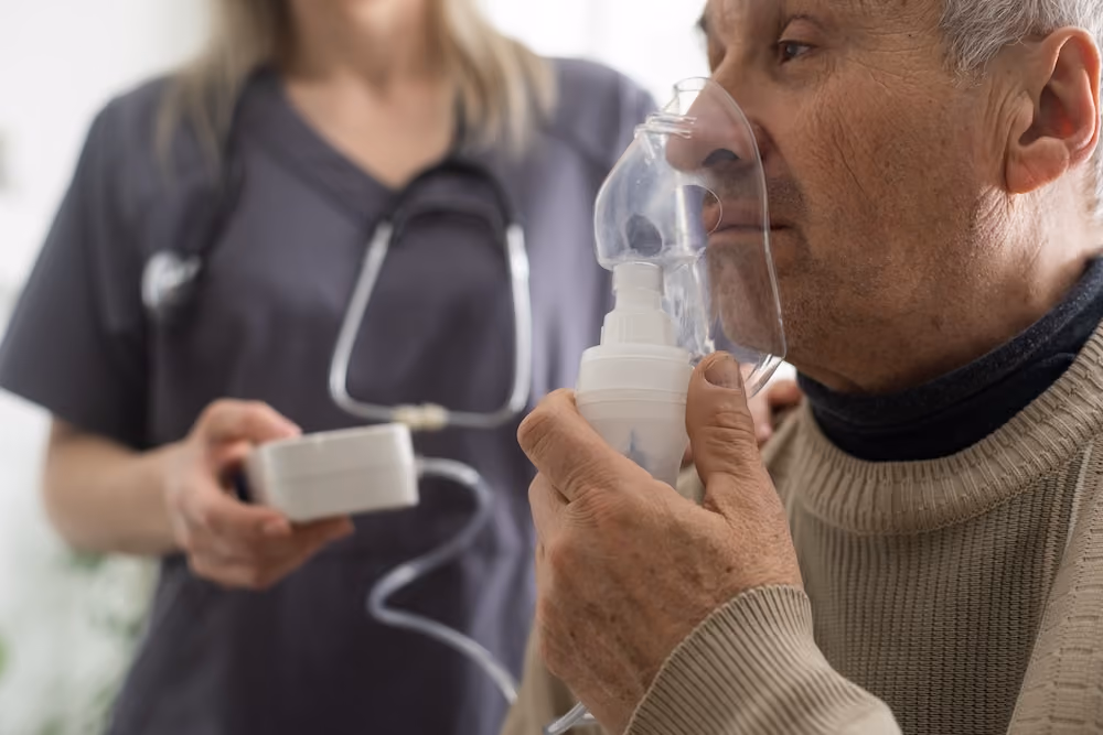 A man using a COPD nebulizer