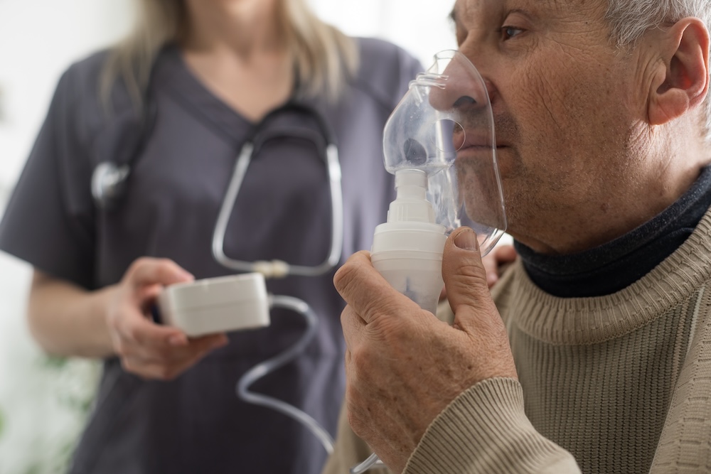 A man using a COPD nebulizer