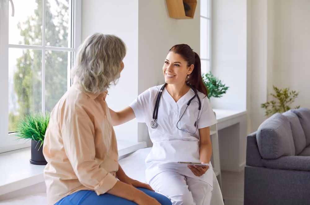 A senior speaking to a doctor