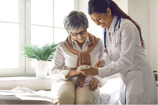 doctor helping patient in doctors office