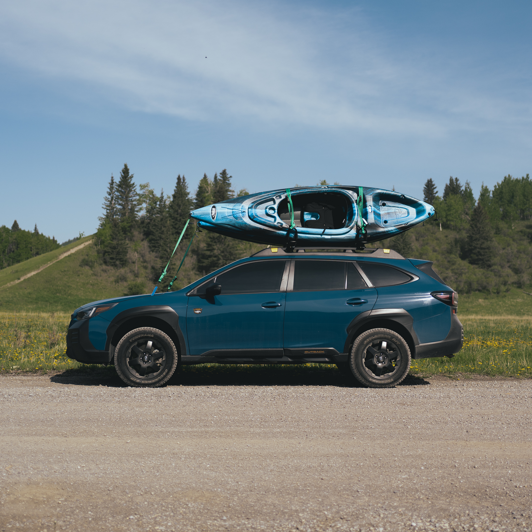 RalliTEK lift springs providing added height and load support on an off-road Subaru Outback.