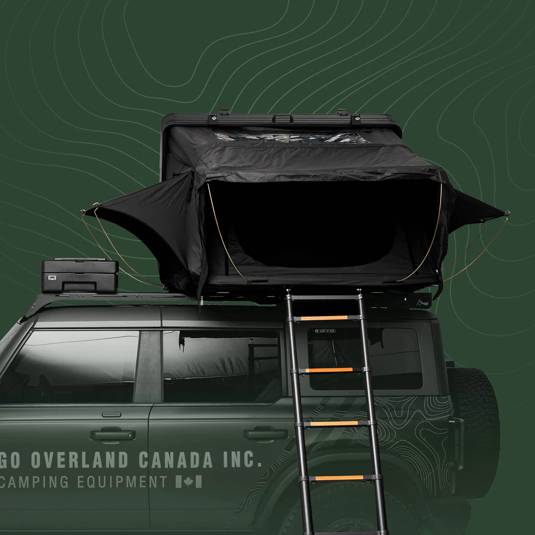 Hard shell roof top tent on lifted overland vehicle