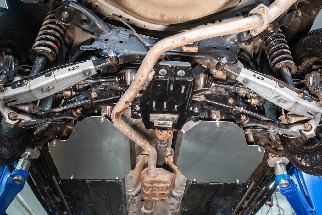 Aluminum skid plates on Subaru Forester protecting the gas tank