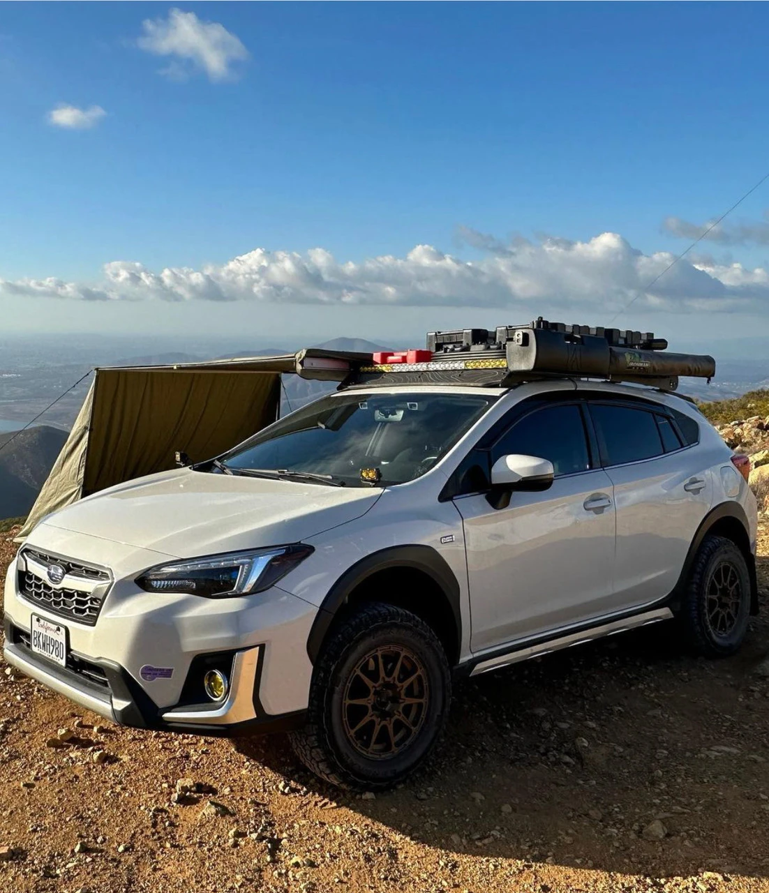 Lifted Subaru Crosstrek with 2” lift kit using OEM style upgraded struts