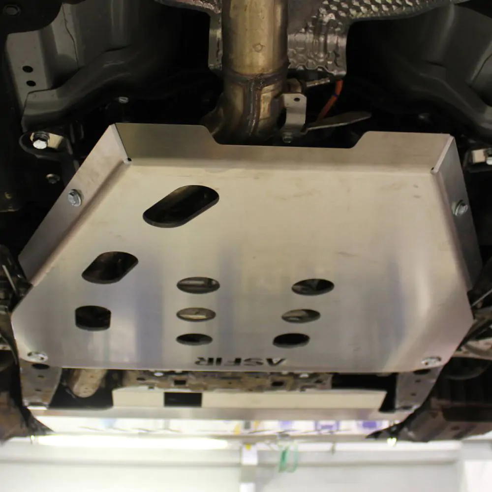 Thick aluminum skid plate protecting the transmission of the Subaru Outback