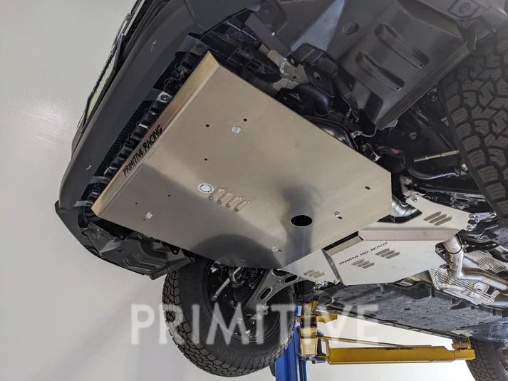 Primitive Racing 3/16" Aluminum Front Skid Plate installed on a Subaru Crosstrek for maximum oil pan and engine protection.