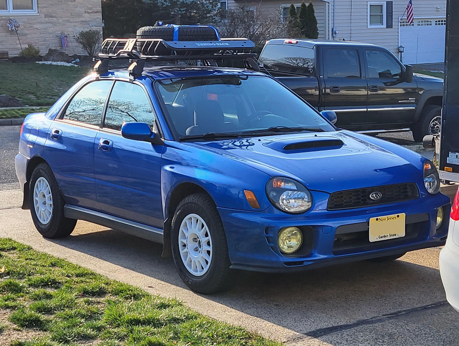 Lifted Subaru WRX with coilovers and other overland accessories off road