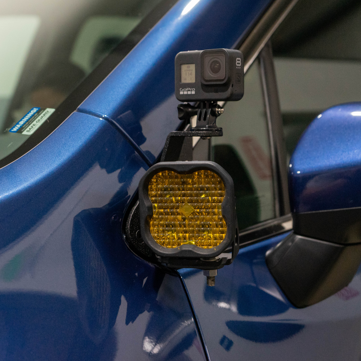 SMK Fabrication ditch light bracket installed on Subaru Ascent hood hinge