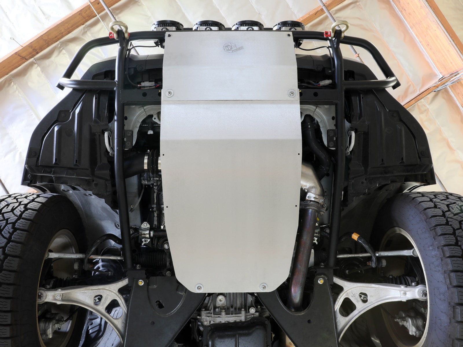 aFe Power Terra Guard engine skid plate installed on a Subaru Outback