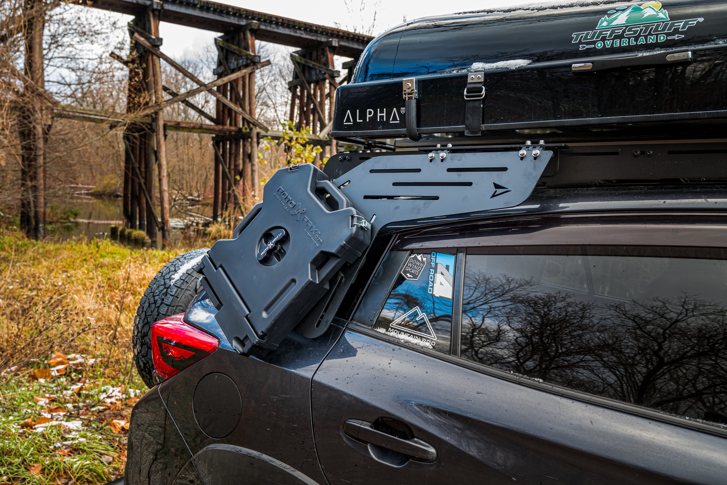 Overland Subaru Ascent with additional cargo capacity mounted on rack wing