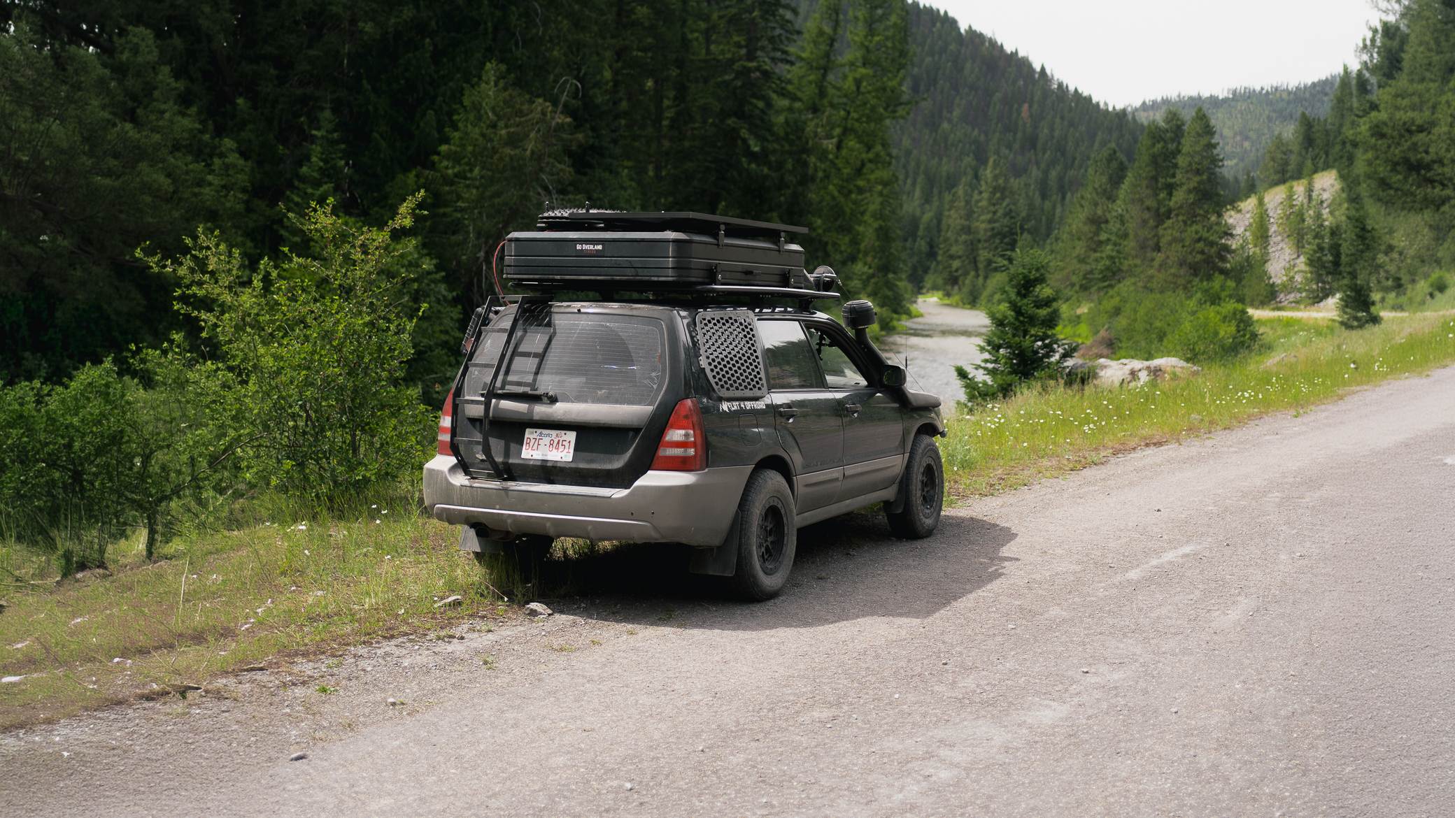 Overland Subaru Forester with rear hatch ladder