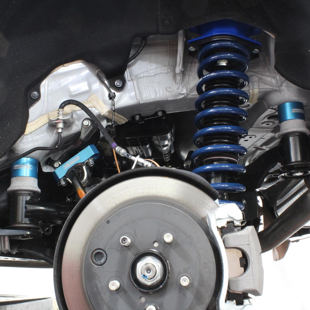 RalliTEK Subframe Drop Kit with blue anodized aluminum spacers for the Subaru WRX