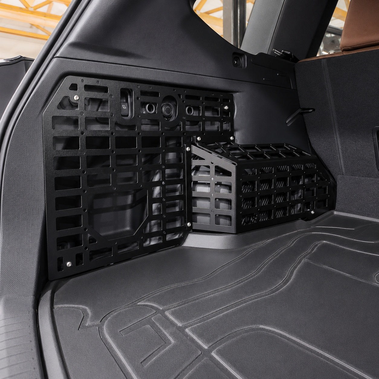 ADF Molle Storage Racks in a 2025 Subaru Forester cargo area, the mounting base for the slider shelf