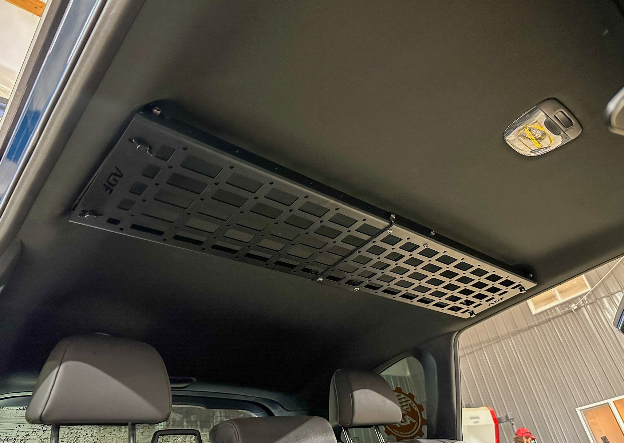 ADF Headliner Molle Rack above the rear seats of a Subaru Impreza