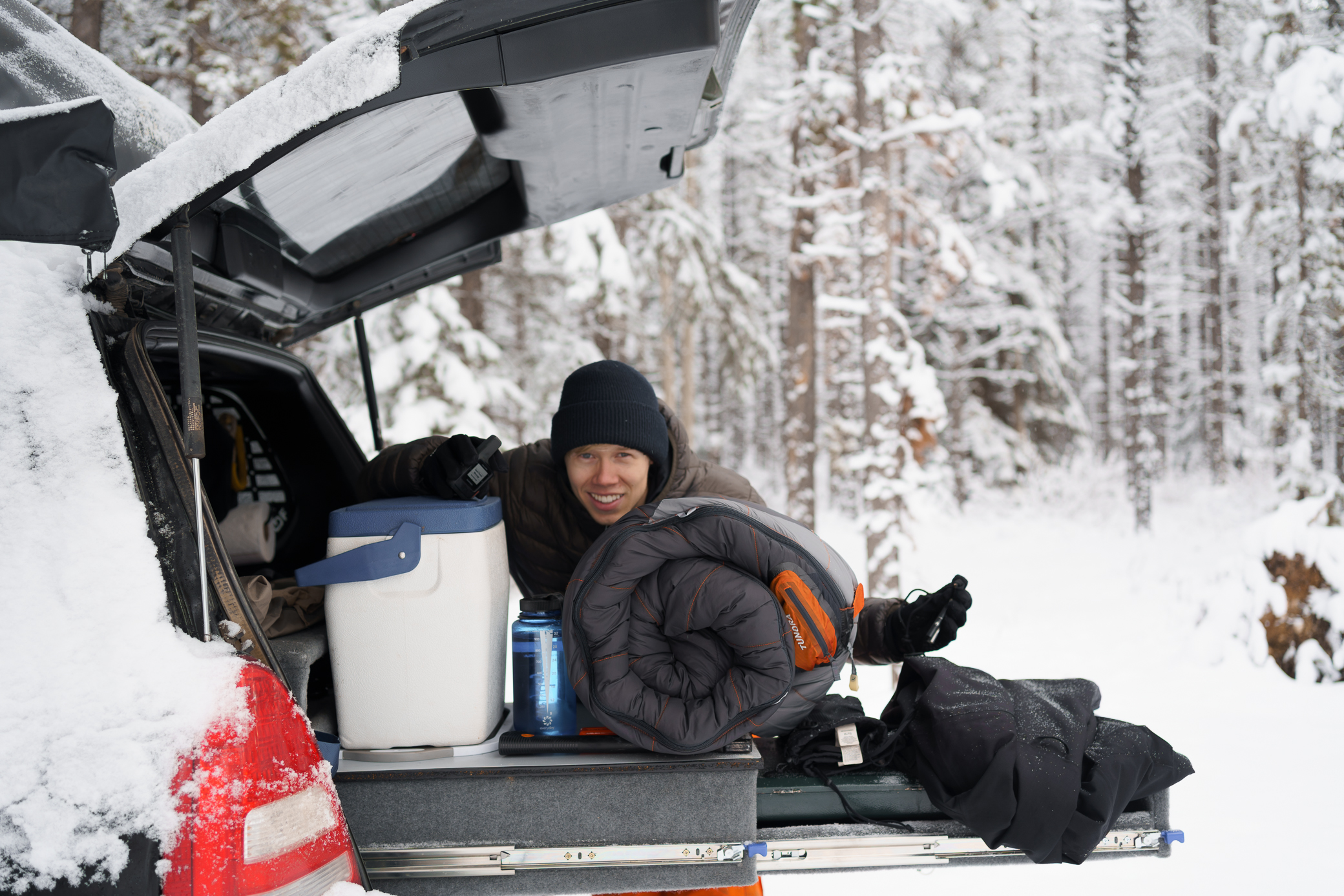Chase with his winter camping gear in his 2004 Subaru Forester