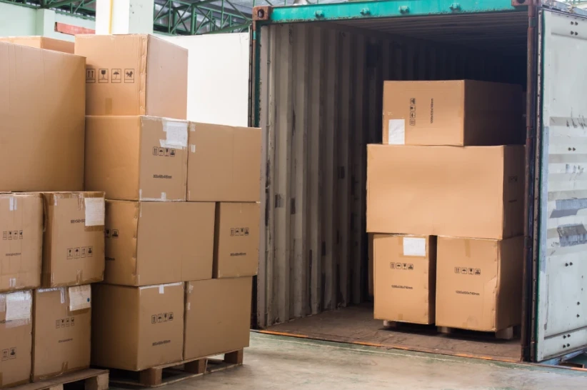 Pallets of boxes being unloaded from a truck