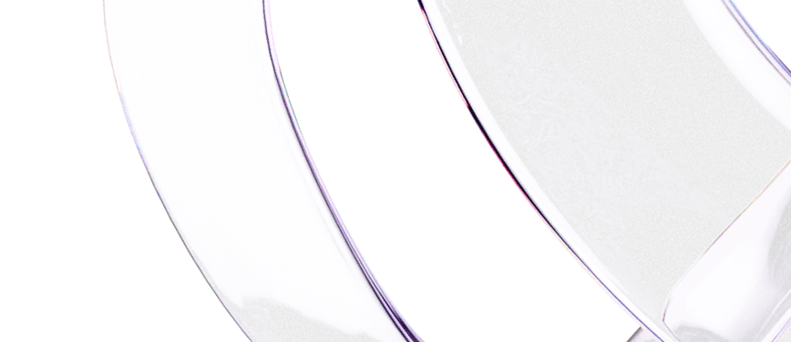 A close up of a pair of scissors on a black background.