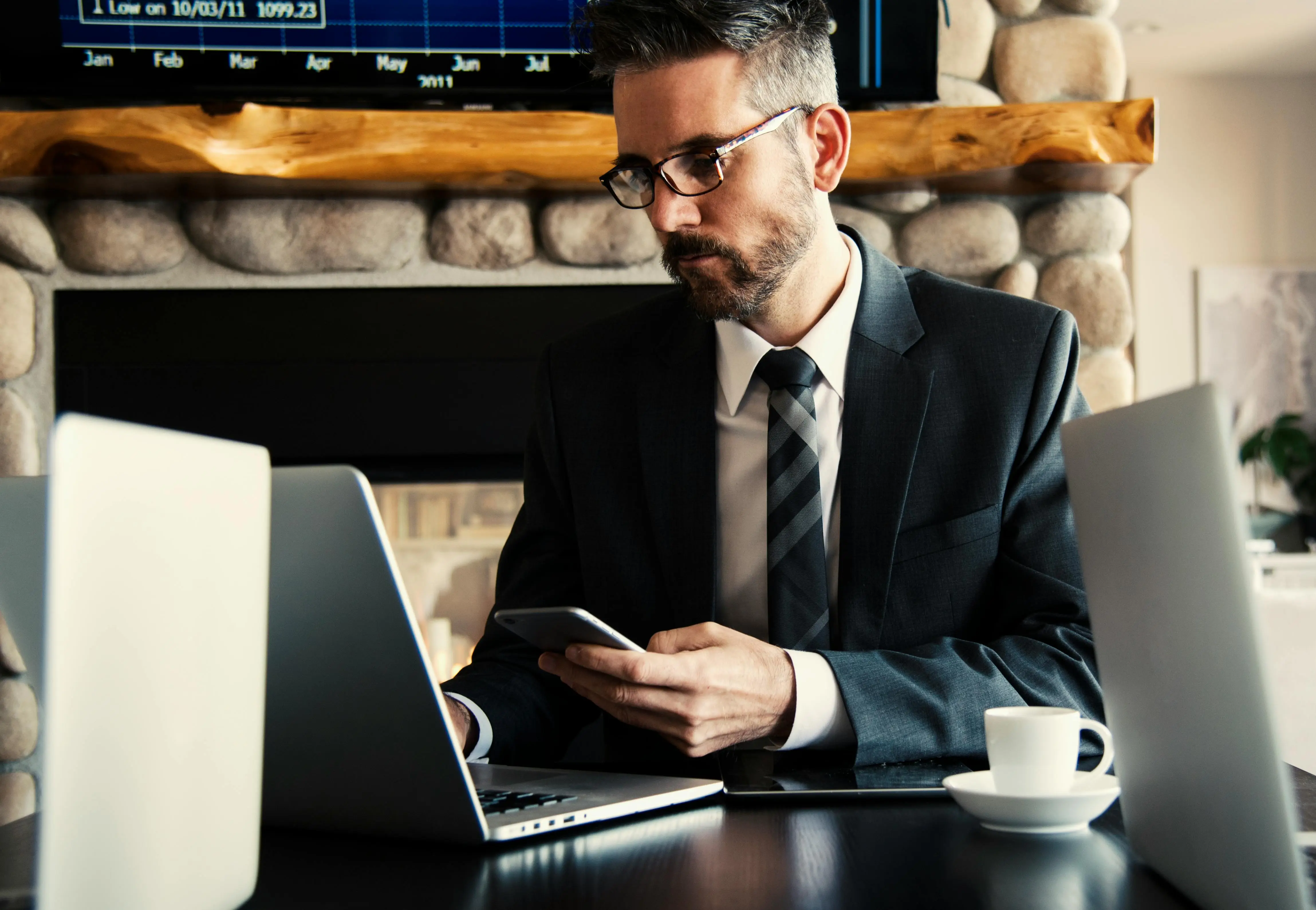 Salesperson reviewing his laptop