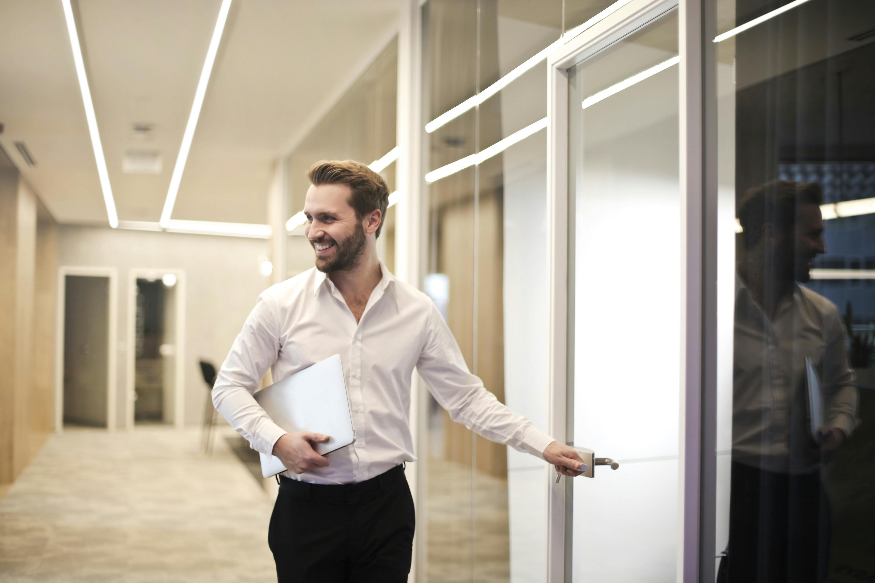 employee walking in to meeting room