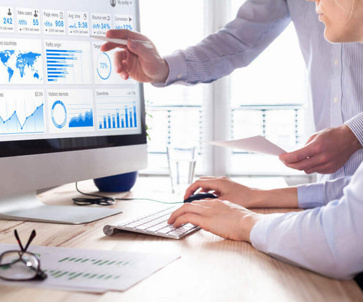 Office worker looking at graphs
