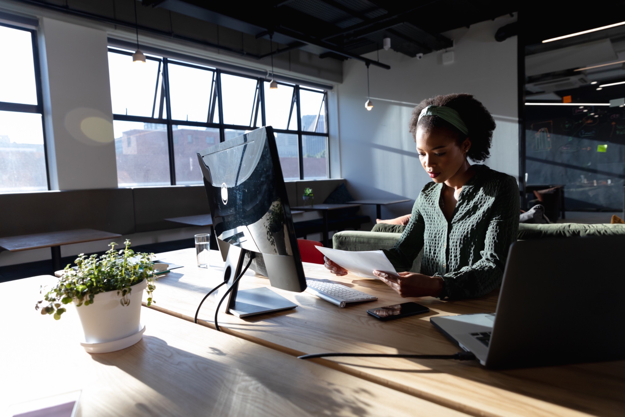 human judgment sales qualification, sales rep reviewing prospect data, qualification conversation preparation, human review AI outputs, sales professional workspace, strategic sales decision making, relationship driven sales research