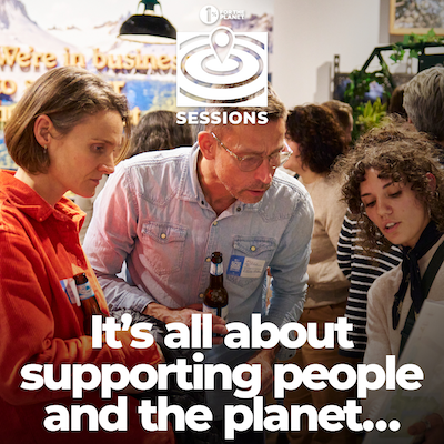 Three people looking at a paper with text that says, "It's all about supporting people and the planet..."