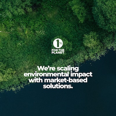 Green nature background with text that says, "We're scaling environmental impact with market-based solutions."