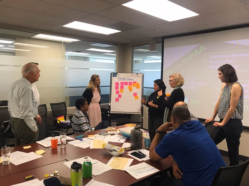 Hopelab team discussing the rollout plan for the Goal Mama app at NFP headquarters