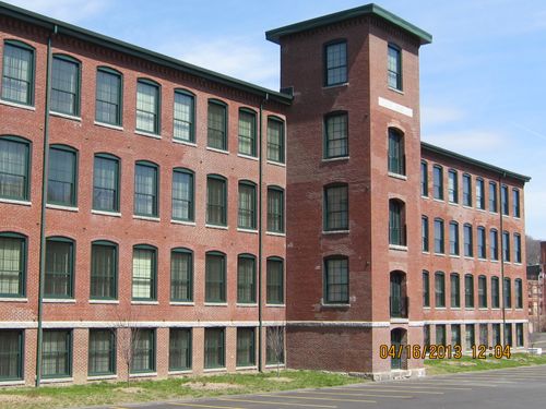 brick building exterior with tower