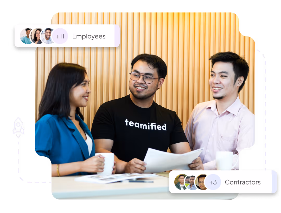 Two Teamified workers in a room with many laptops. They are working at finding new contract roles.