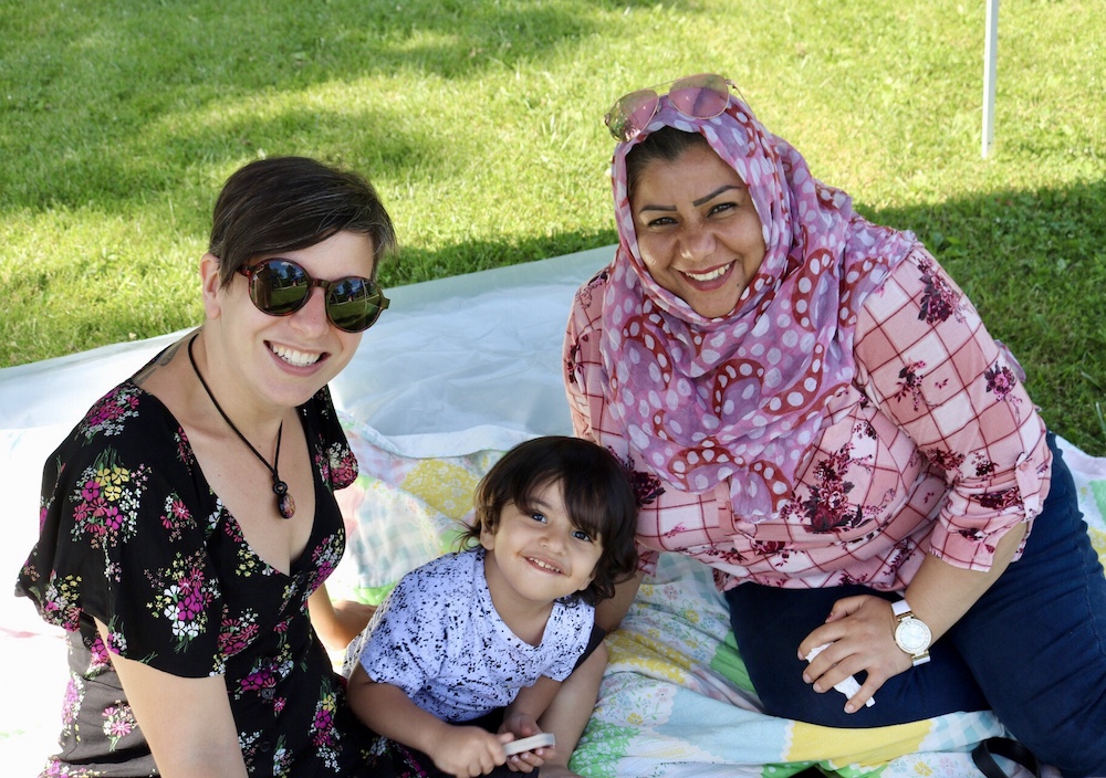 Family mentor and mentees at a picnic