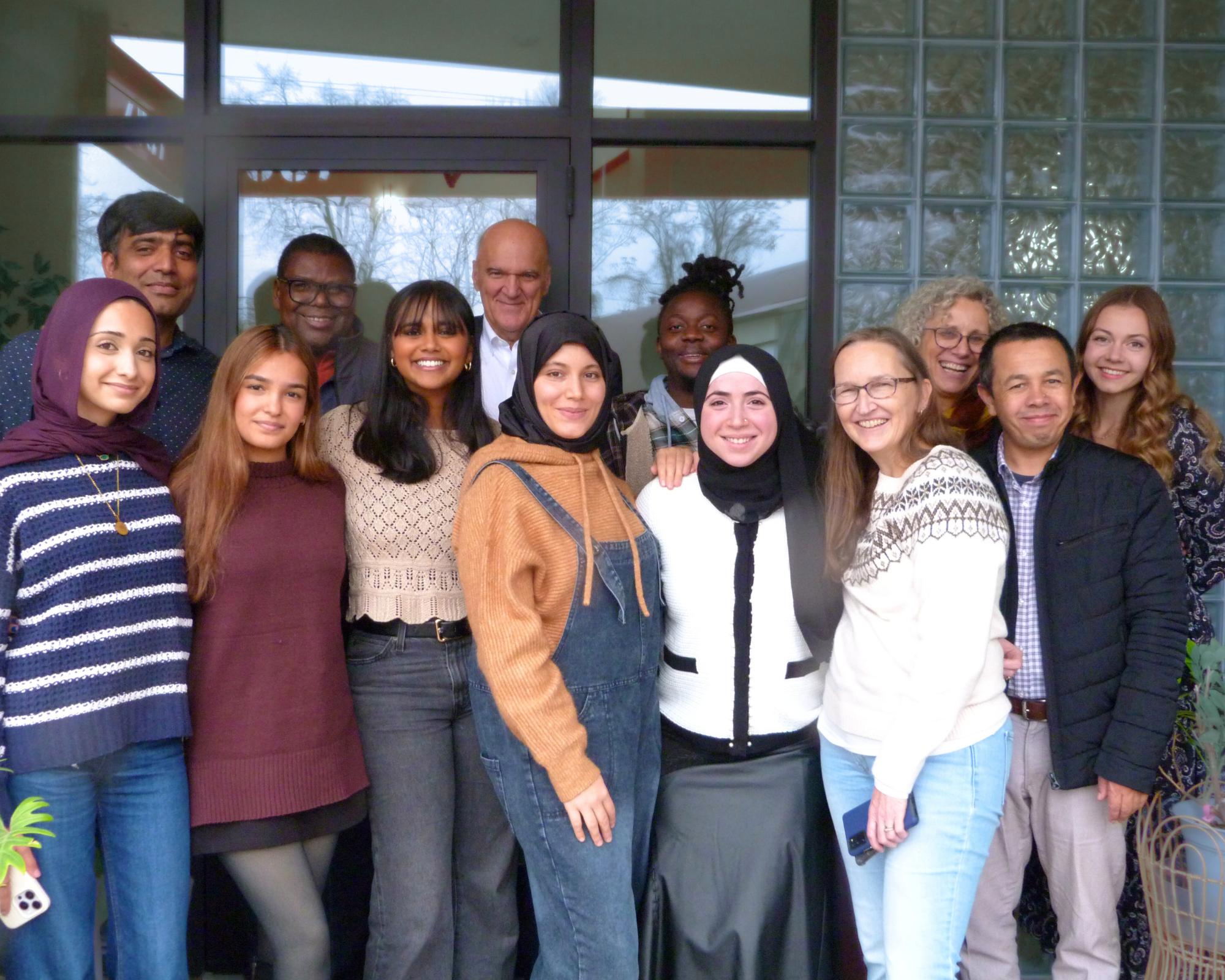 A group photo of the entire Family Health Services team at Hello Neighbor.