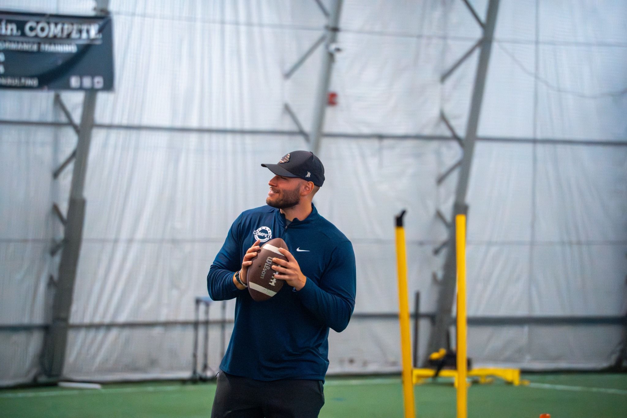 Head Performance Coach Sam Greenfield coaching football