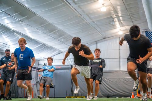 College athletes doing speed exercises in the compete fieldhouse in Norwood MA